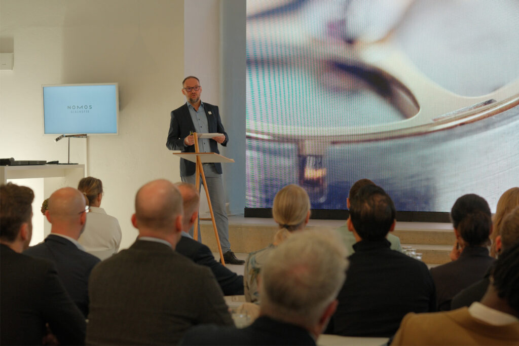 Mirko Heyne giving a presentation at the Nomos Forum 2025