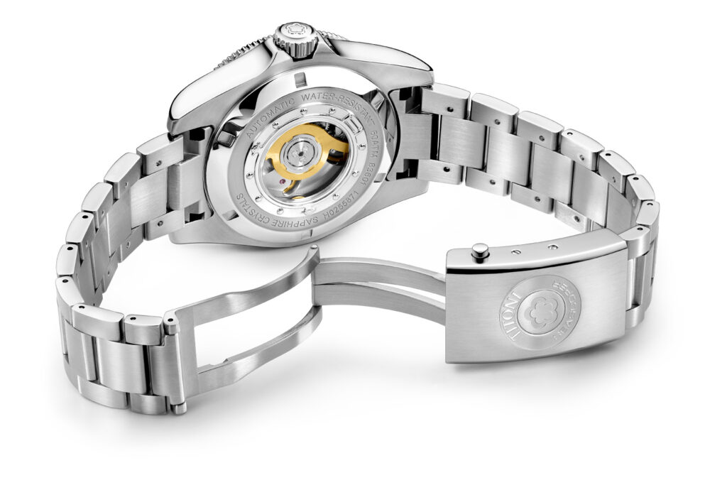 View through the sapphire crystal case back of the Titoni Seascooper 600 to the COSC-certified in-house caliber T10.