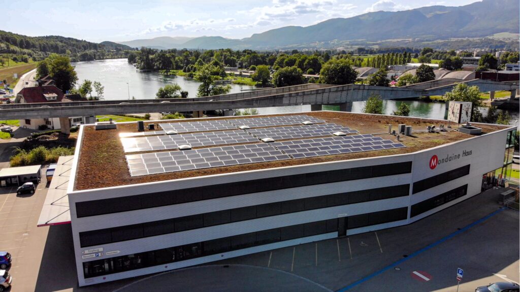 Mondaine headquarters in Biberist with solar panels on the roof