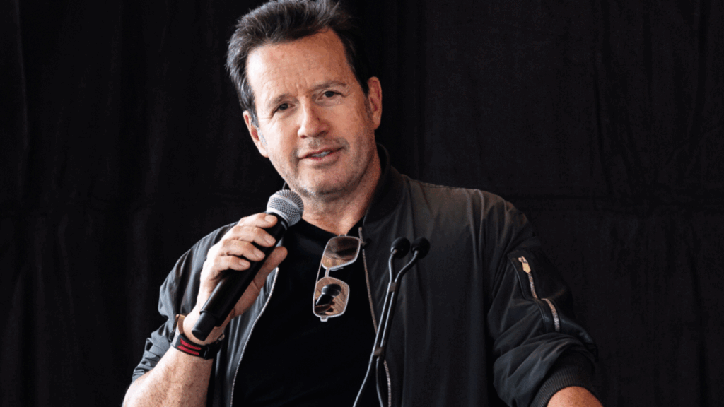 François-Henri Bennahmias with a microphone in his hand