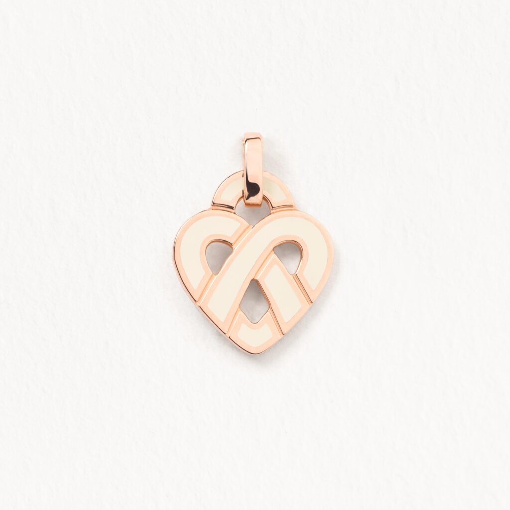 Kleiner Anhänger "Coeur Entrelacé" aus Roségold mit Emaille.
