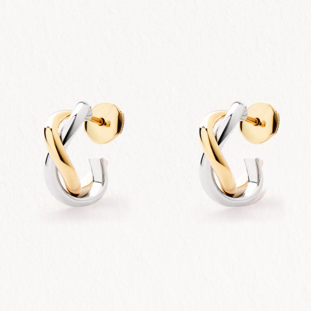 Creolen "Tresse" im Bicolor-Look aus 18 Karat Gelbgold und Weißgold.