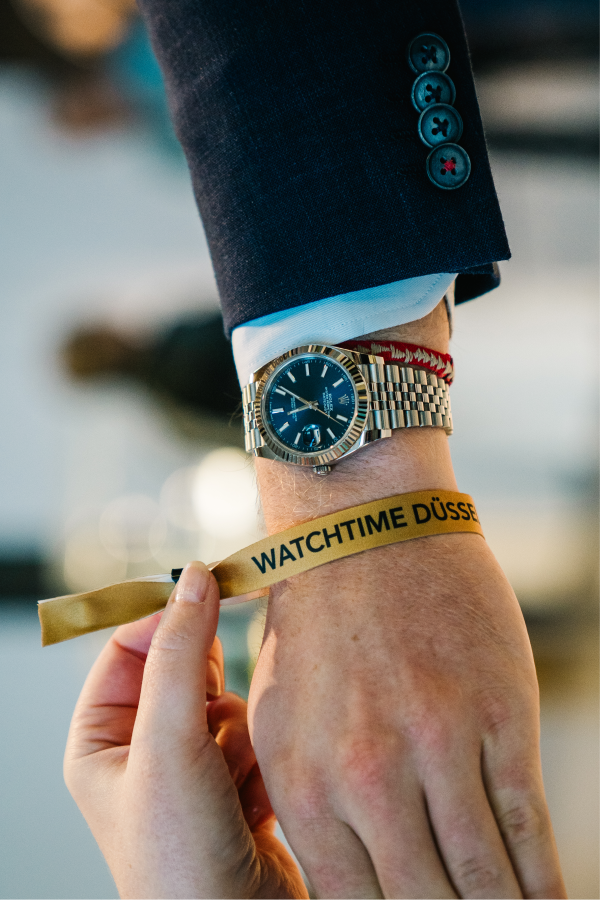 Arm mit Uhr
