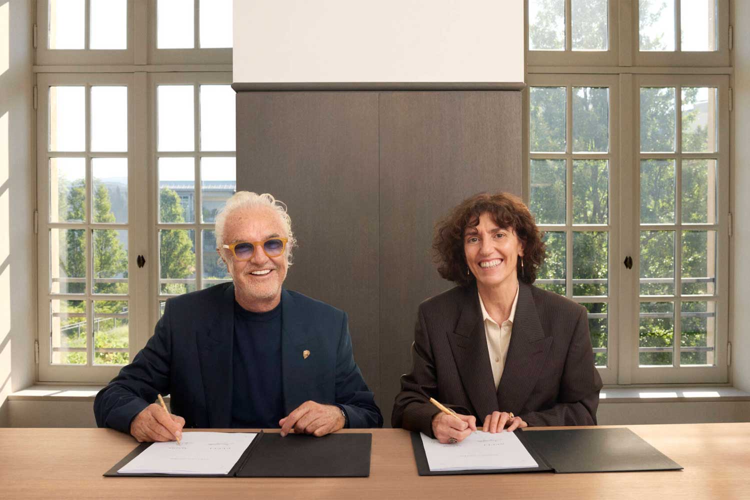 Flavio Briatore and Francesca Bellettini sign the partnership agreement