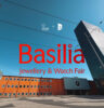 Halle 2 und Messeturm der Messe Basel mit dem Logo der Messe Basilia