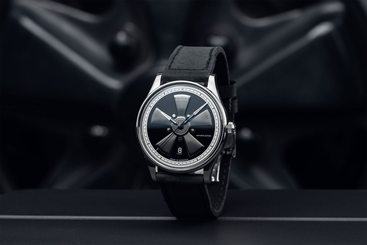 Noramis Date Limited Edition Petro Surf 2026 by Union Glashütte, in front of a wheel rim