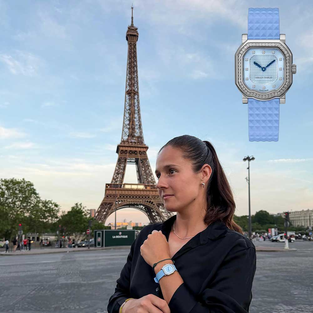 Daria Kasatkina in front of the Eiffel Tower, wearing a Mini Maestro by Gerald Charles on her wrist