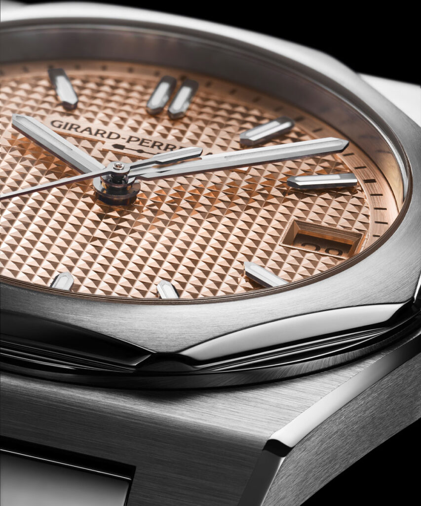 Girard-Perregaux Laureato Fifty 36 mm with a gold dial and diamond bezel