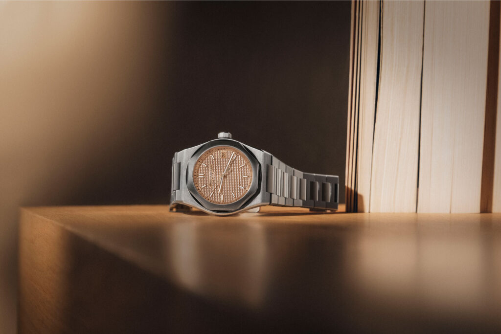 Girard-Perregaux Laureato Fifty 39 mm with a gold dial and diamond bezel