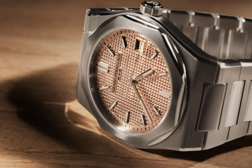Girard-Perregaux Laureato Fifty 39 mm with a gold dial and diamond bezel