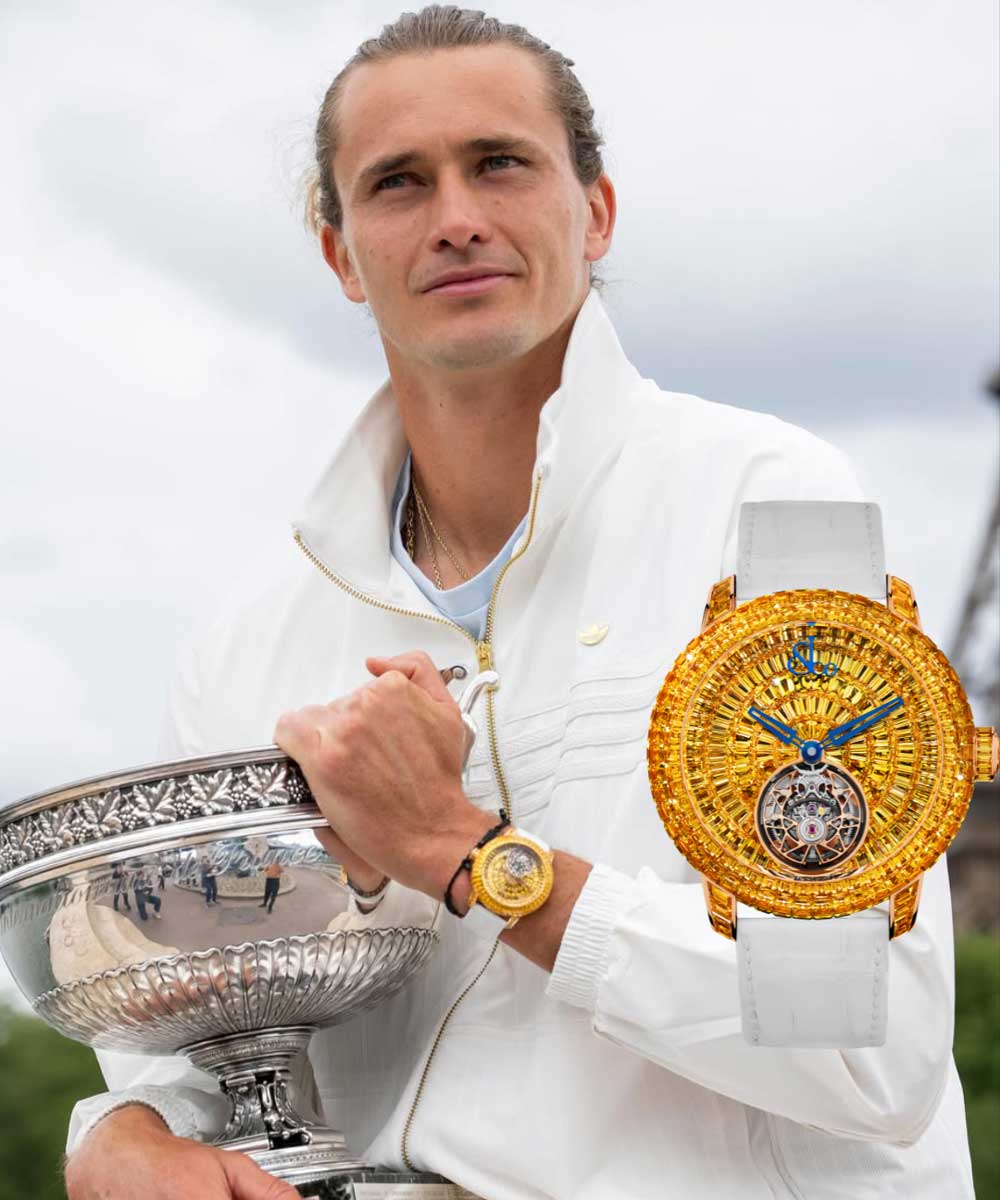Alexander Zverev, wearing a Jacob & Co. watch on his wrist, poses with the Coupe des Mousquetaires