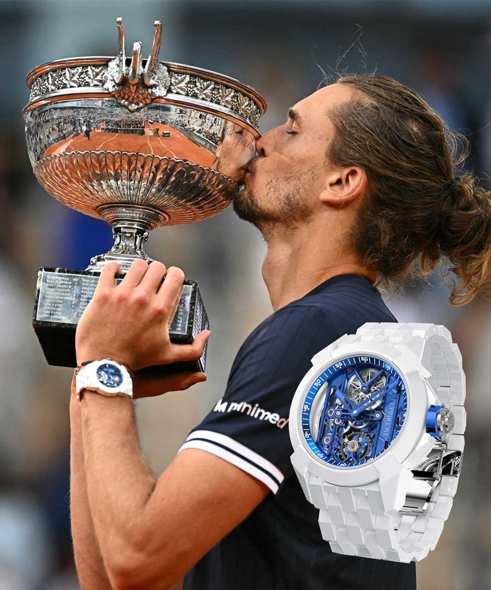 Alexander Zverev, wearing a Jacob & Co. watch on his wrist, kisses the Coupe des Mousquetaires