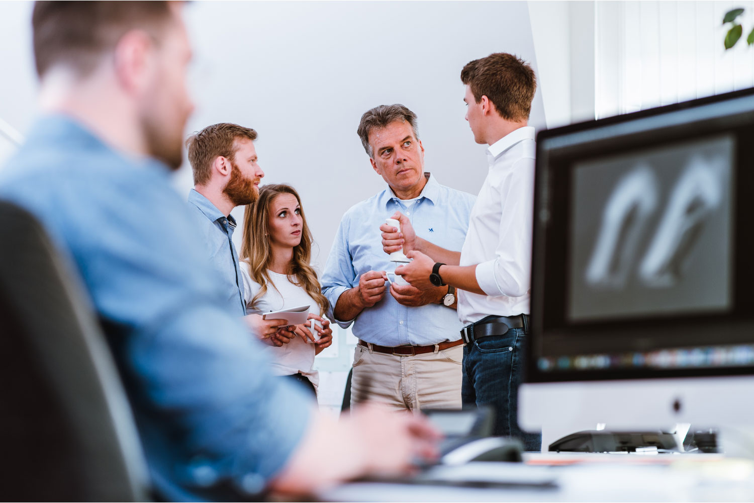 Teambesprechung im Botta-Atelier mit Klaus Botta in der Mitte