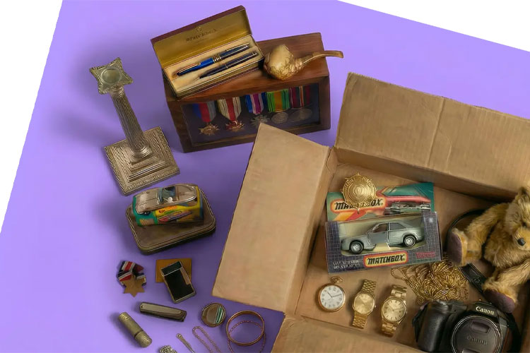 Secondhand items on a table and in open packages