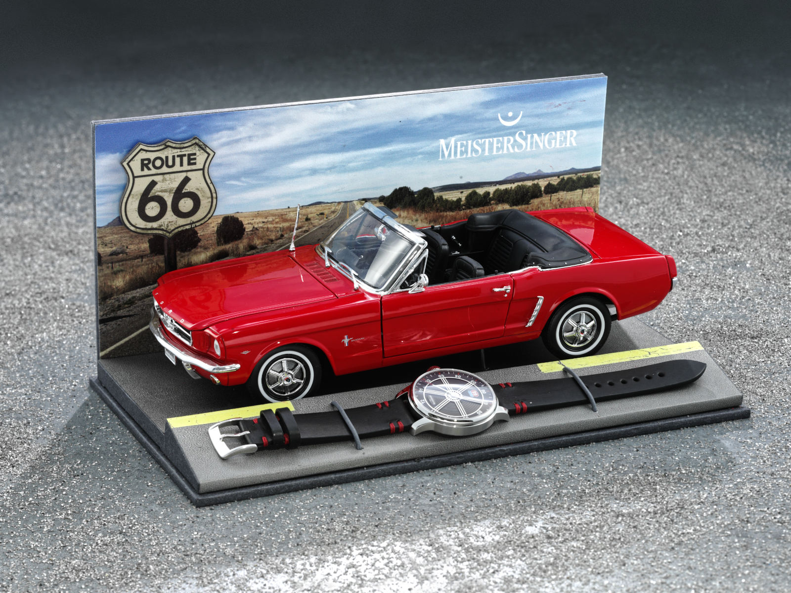 Präsentationsbox der MeisterSinger Edition Route 66 mit Uhr und rotem Ford Mustang Modell