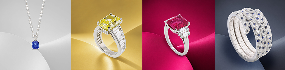 Cartier sapphire necklace, yellow diamond ring, ruby ring, and Panthère bangle